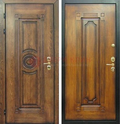 Коричневая металлическая дверь с массивом дуба с рисунком ДМД-10 в Раменском