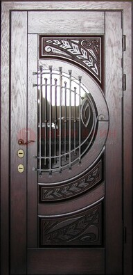 Одностворчатая входная дверь со стеклом и ковкой ДСК-21 в Раменском