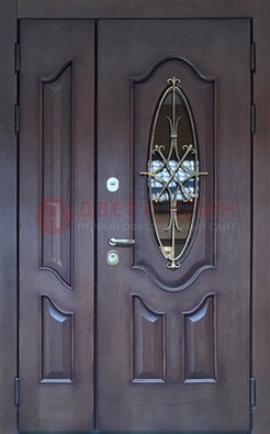 Темная металлическая дверь Винорит со стеклом и ковкой ДСК-239 в Раменском