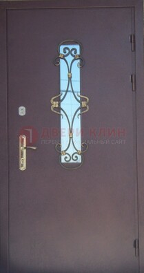 Металлическая дверь со стеклом и ковкой ДСК-77 в Раменском