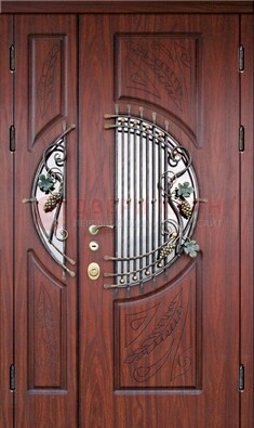 Железная дверь с виноритом и стеклом с ковкой ДВТ-170 в Раменском